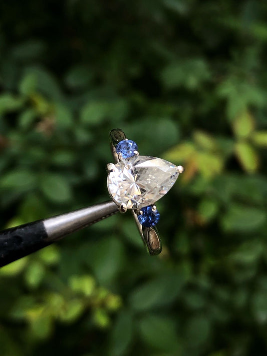 Pear-Cut Moissanite With Two Side Blue Zircon Accent Ring in Sterling Silver 925