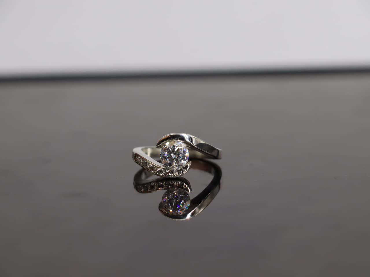 Modern Twist Moissanite Ring - Sparkling Center Stone In Sterling Silver