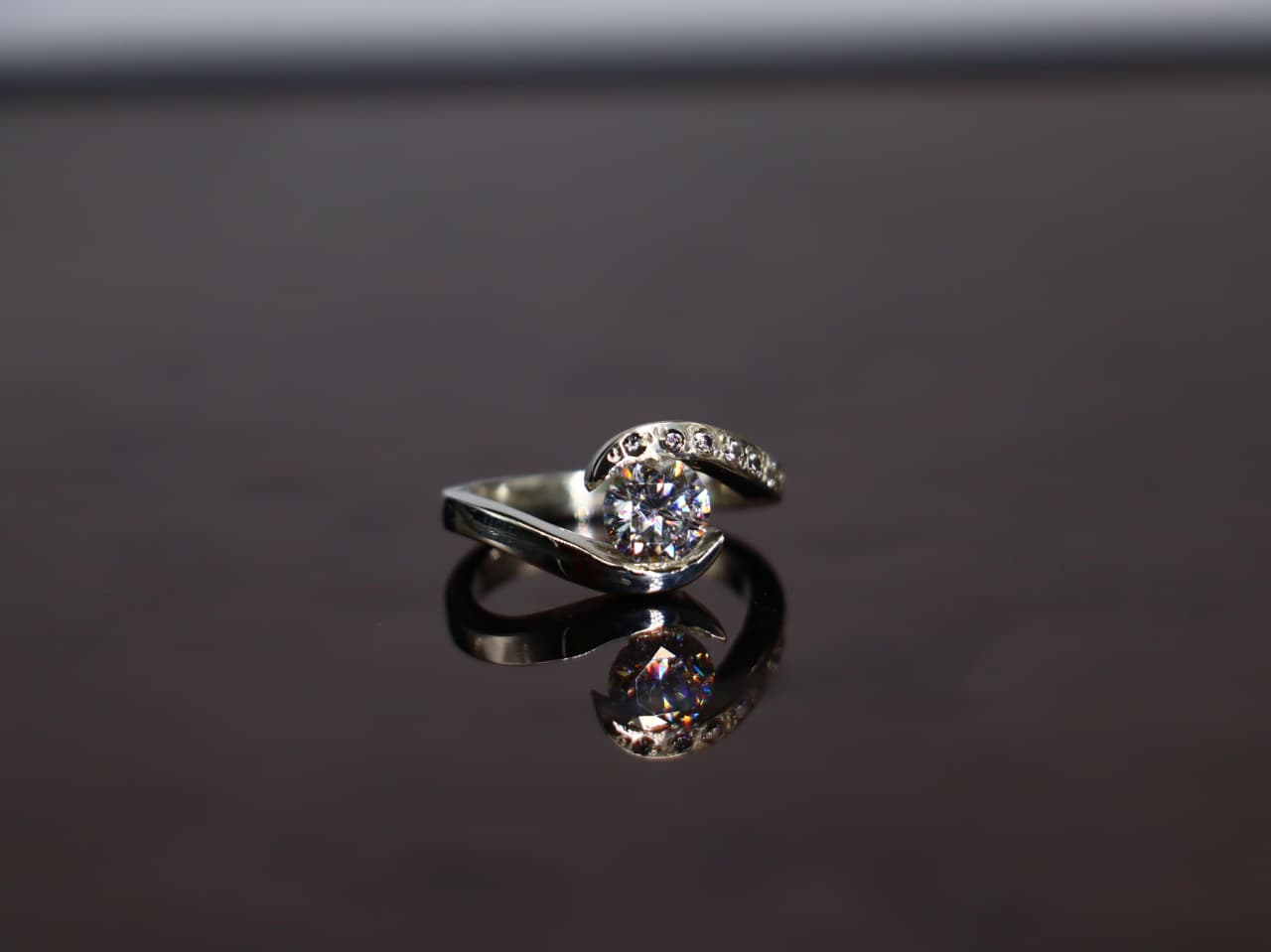 Modern Twist Moissanite Ring - Sparkling Center Stone In Sterling Silver