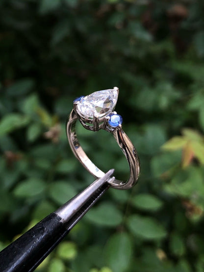 Pear-Cut Moissanite With Two Side Blue Zircon Accent Ring in Sterling Silver 925